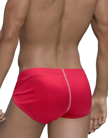 WildmanT mesh brief red bright red swim trunks with subtle textured pattern and contrasting white center seam stitching