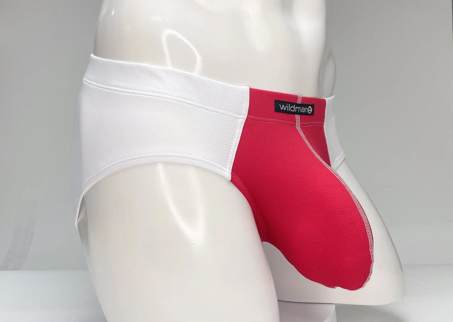 WildmanT mesh briefs in red and white with a wildman brand label on the waistband for men