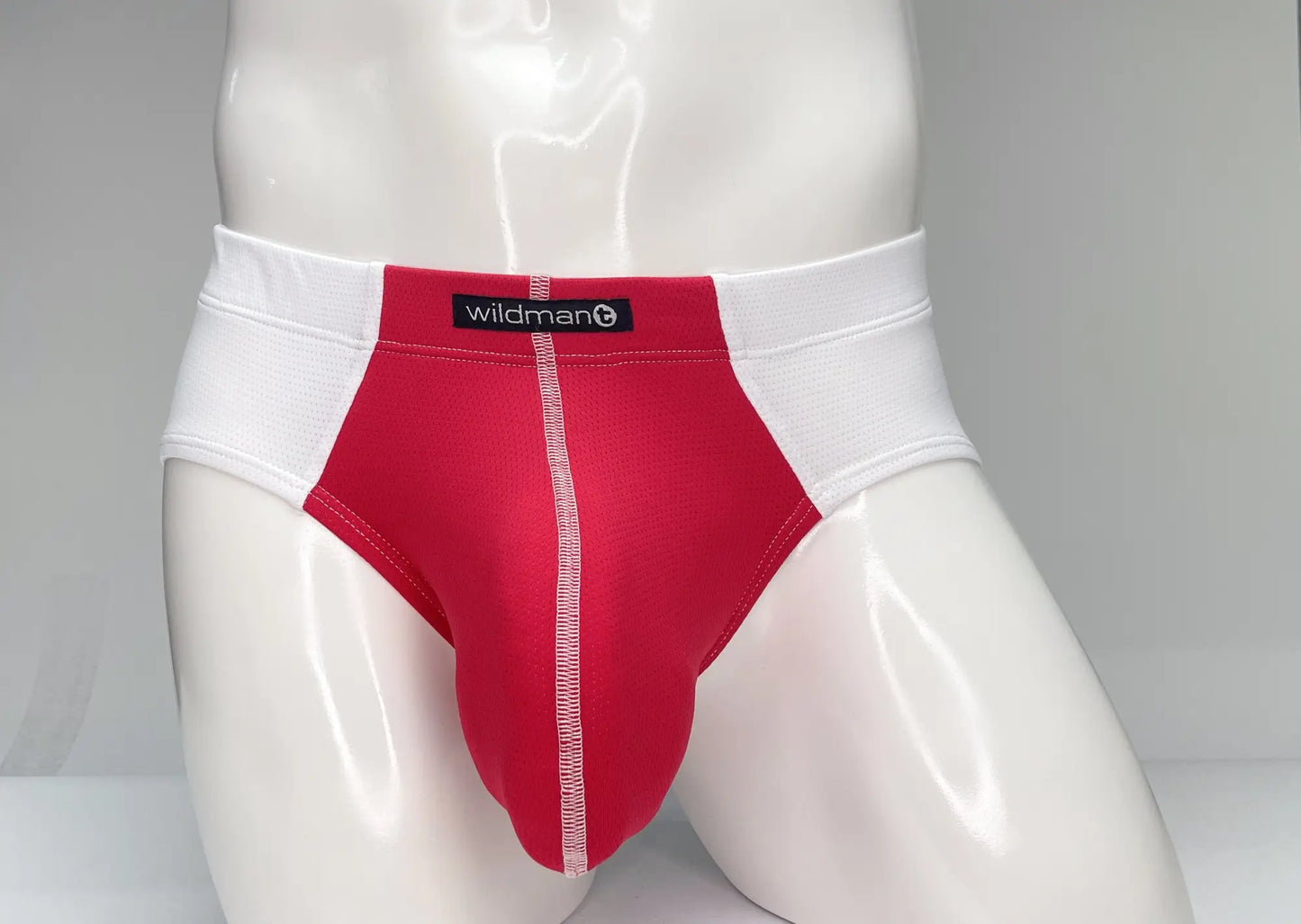 Wildmant mesh brief in white and red featuring a central seam detail and breathable mesh fabric