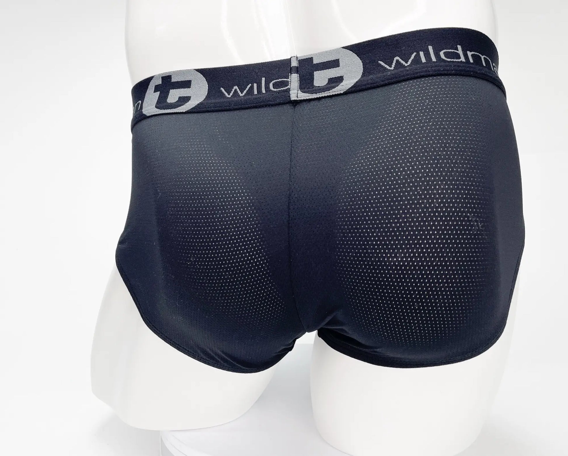 Black mesh WildmanT mesh monster cock brief with gray elastic waistband featuring wildman logo and stylized T emblem