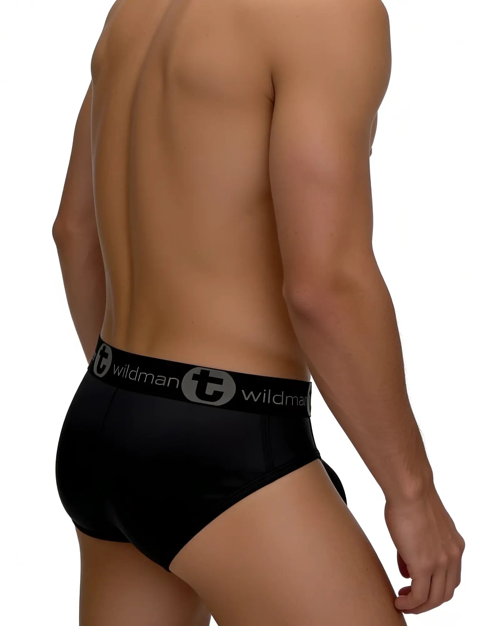 Back view of a man wearing black mesh briefs with a branded "WildmanT" elastic waistband.