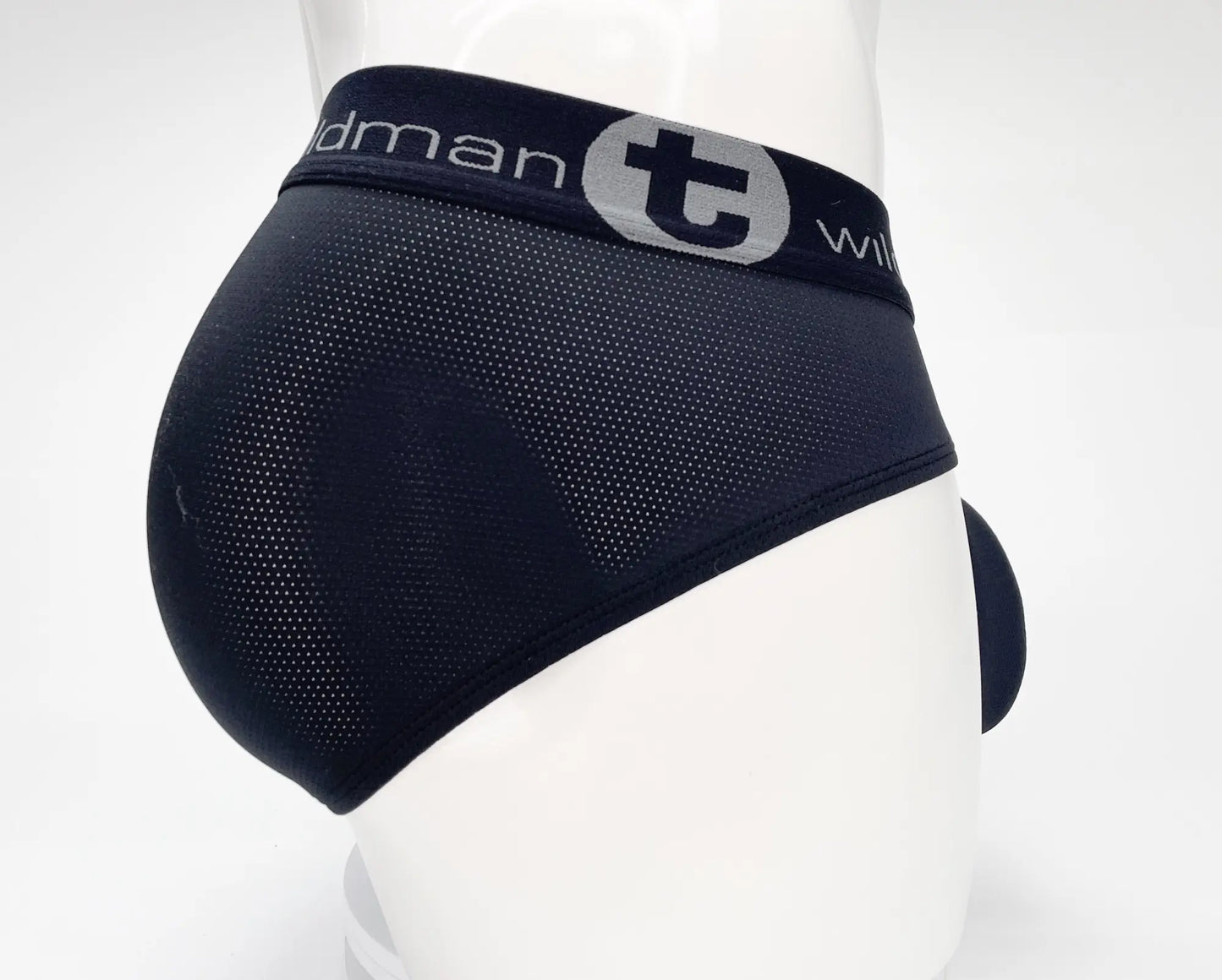 Black mesh briefs with gray logo band featuring the brand name t from wildmant mesh monster cock brief black product