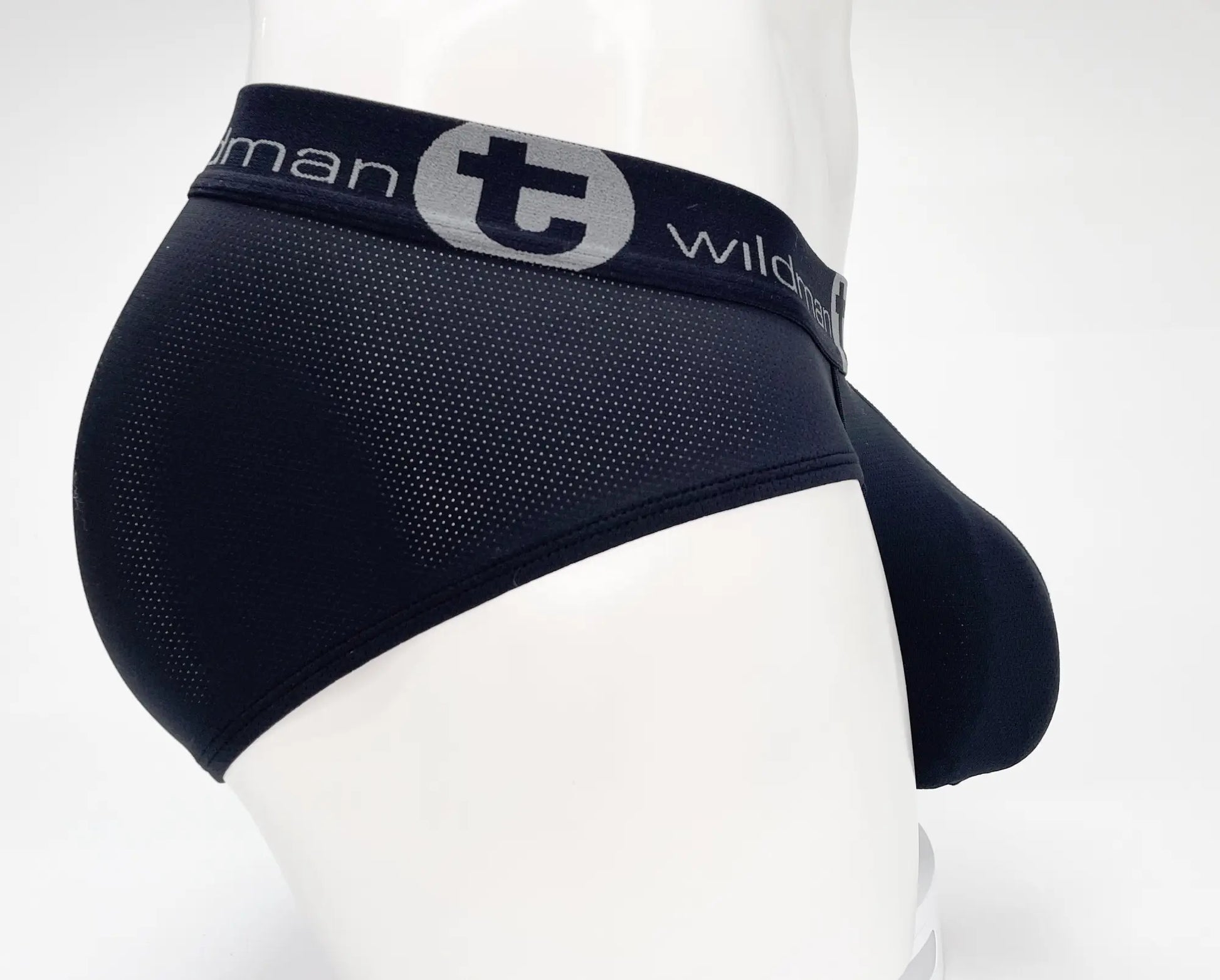 Black mesh briefs with gray logo band featuring man and wildman text from wildmant mesh monster cock brief black product