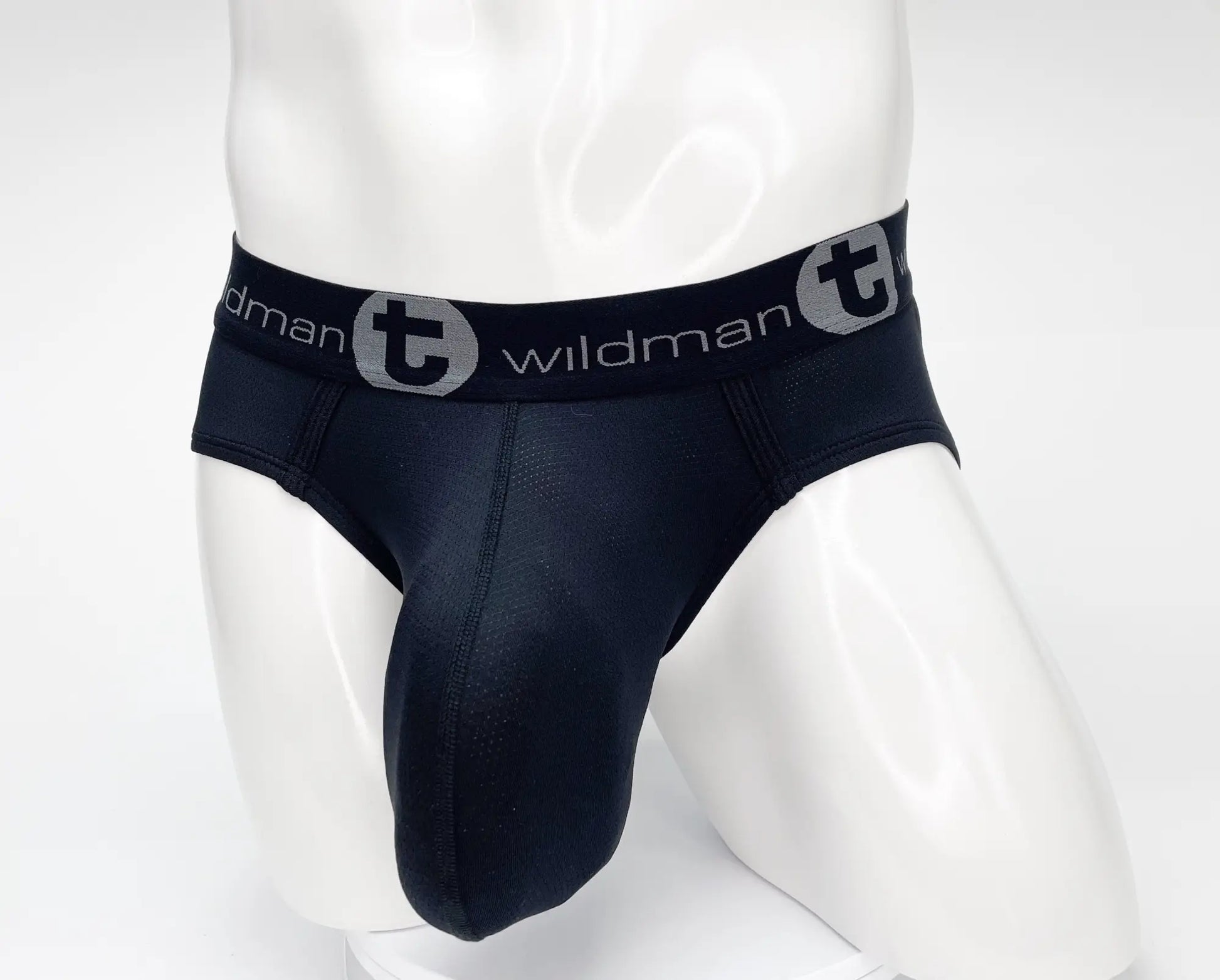 Black wildman mesh monster cock brief with supportive contoured design and elastic waistband featuring logo