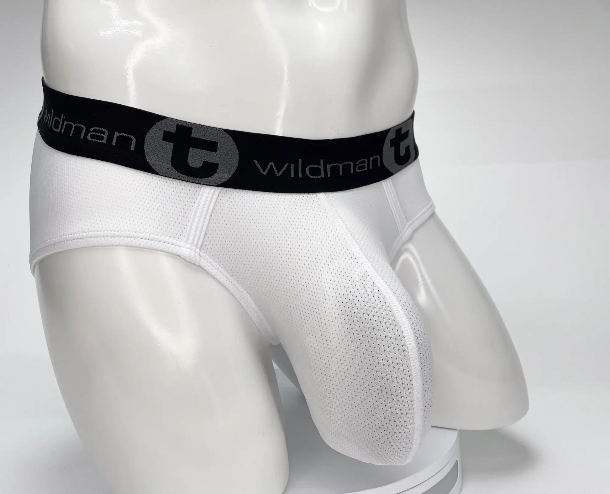 Wildmant mesh monster cock brief white mesh briefs with black elastic waistband and wildman logo