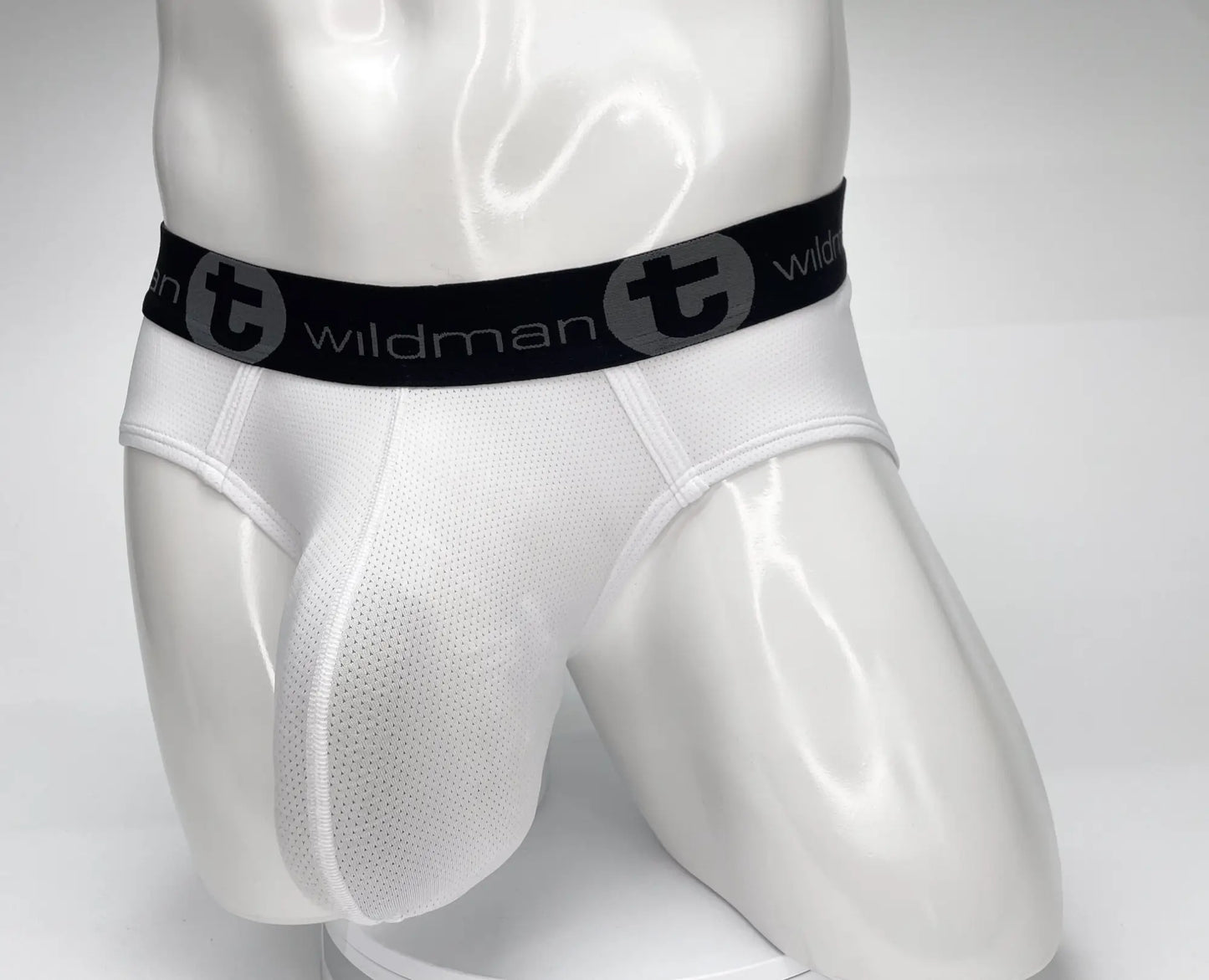 WildmanT mesh monster cock brief white with white mesh fabric and black elastic waistband featuring wildman logo