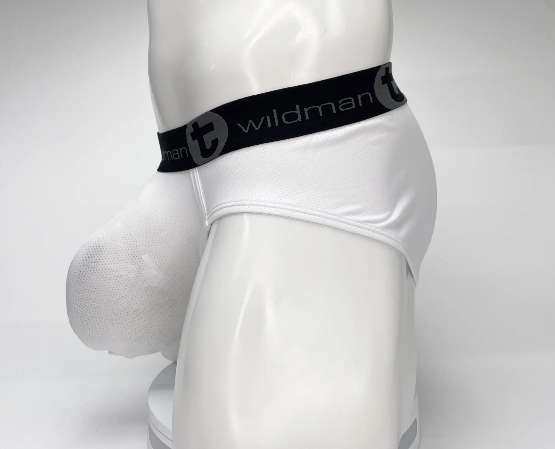 WildmanT mesh monster cock brief white with black elastic waistband featuring wildman logo and stylized t emblem