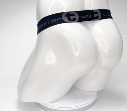 Black elastic waistband with wildman branding on a white mannequin for wildmant mesh monster cock strapless pouch black