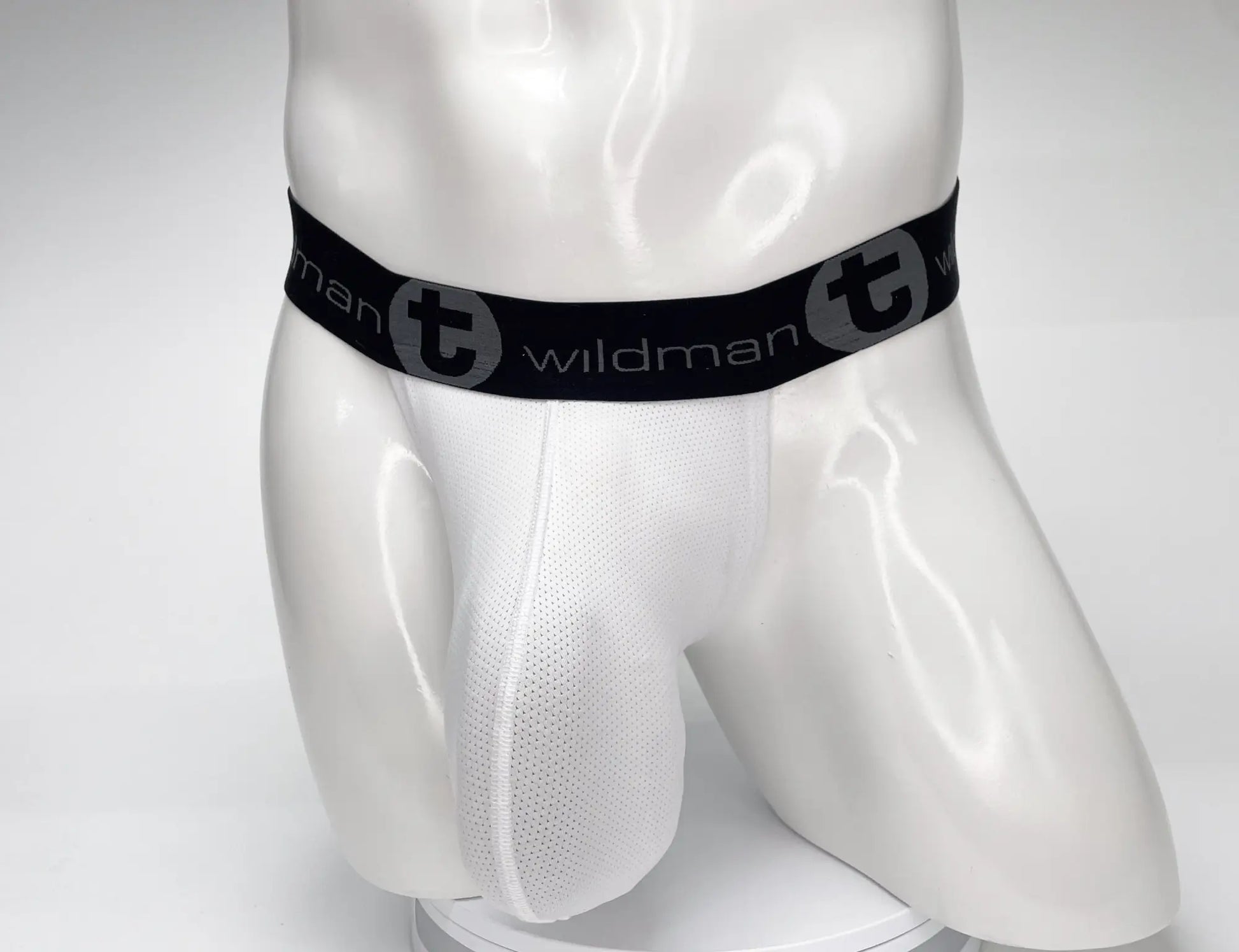 Wildmant mesh monster cock strapless pouch white mesh briefs with black elastic waistband and wildman logo