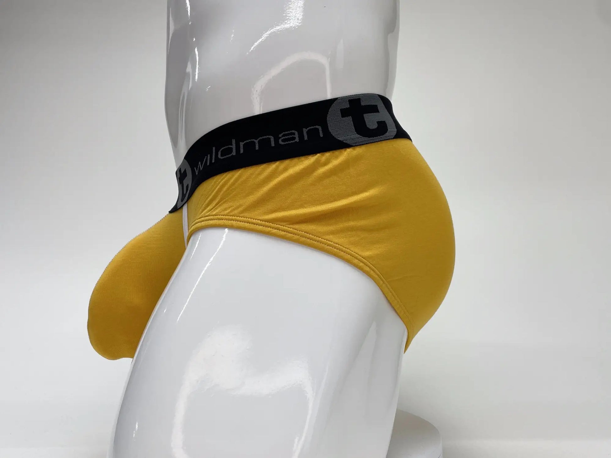 Yellow wildman t modal big boy pouch brief with black waistband featuring wildman t logo