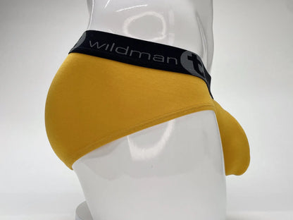 WildmanT modal big boy pouch brief gold in yellow with black elastic waistband featuring wildman logo and circular emblem