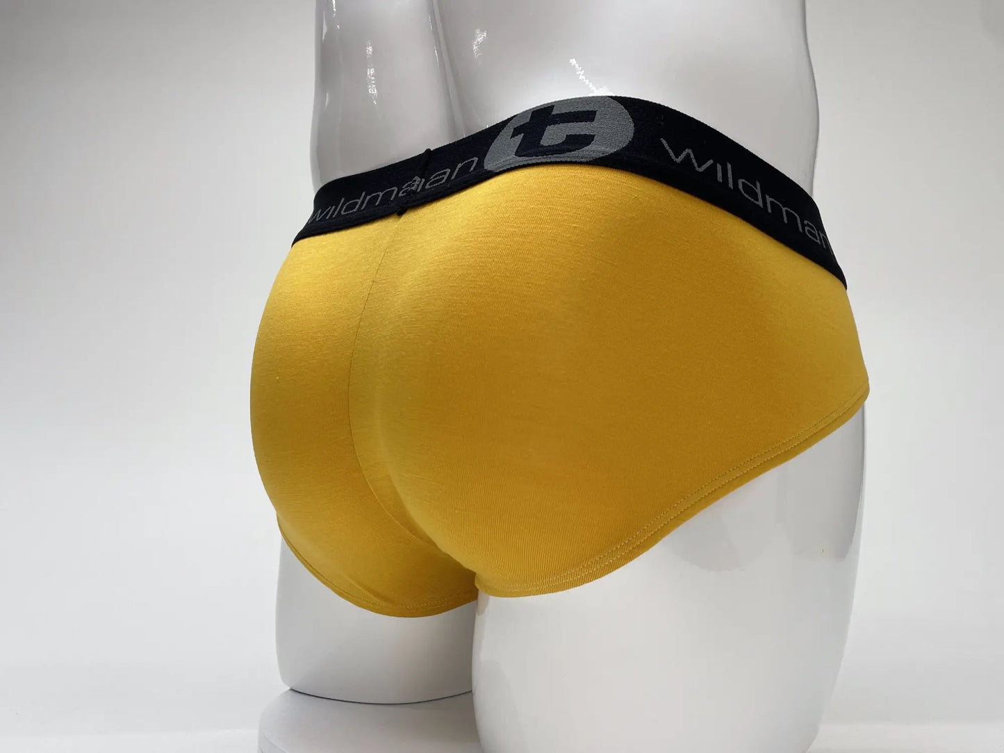 Yellow wildman modal big boy pouch brief gold with black elastic waistband featuring gray wildman logo and name