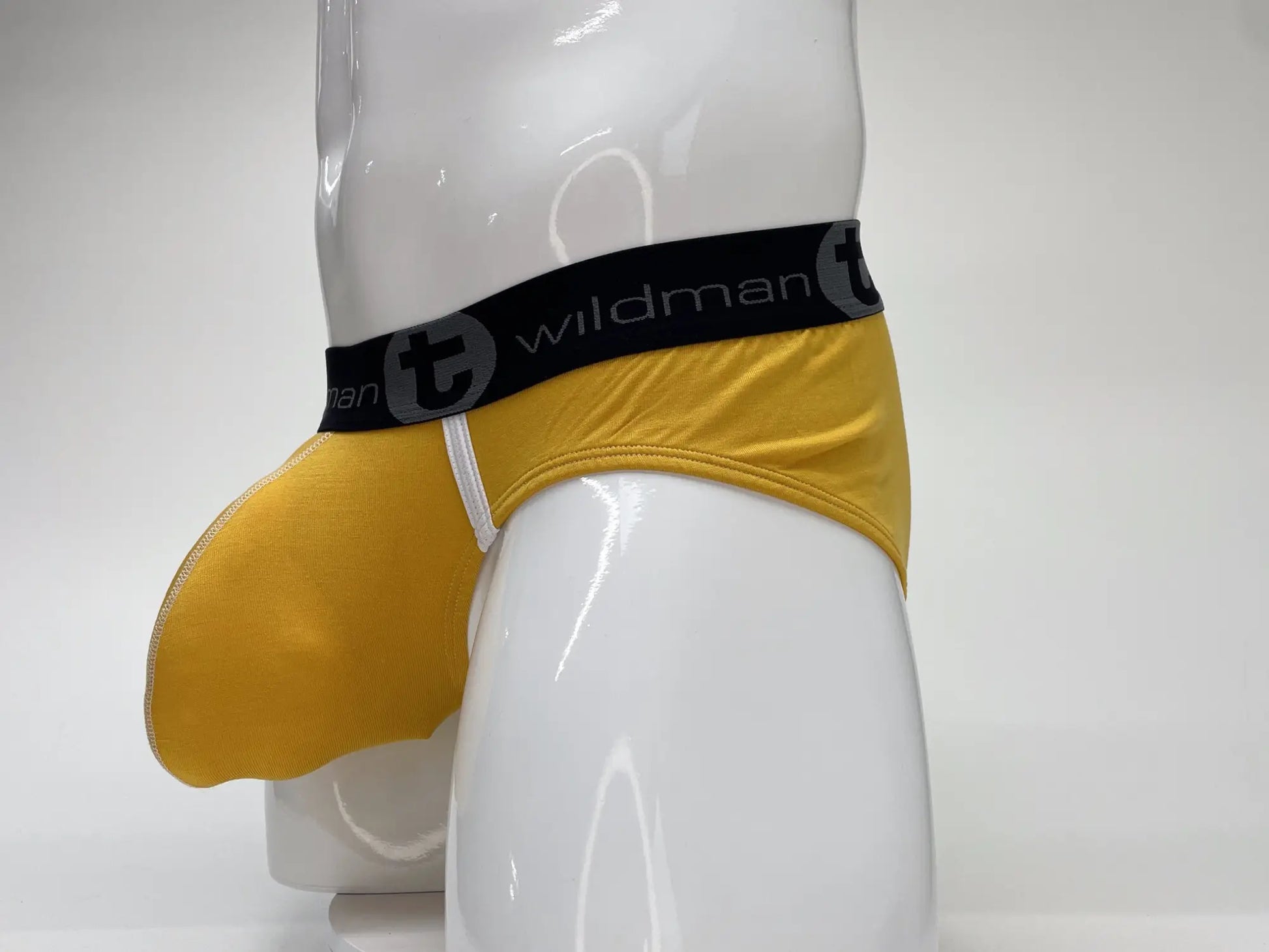Yellow wildman modal big boy pouch brief gold with black elastic waistband featuring t logo and gray brand name text