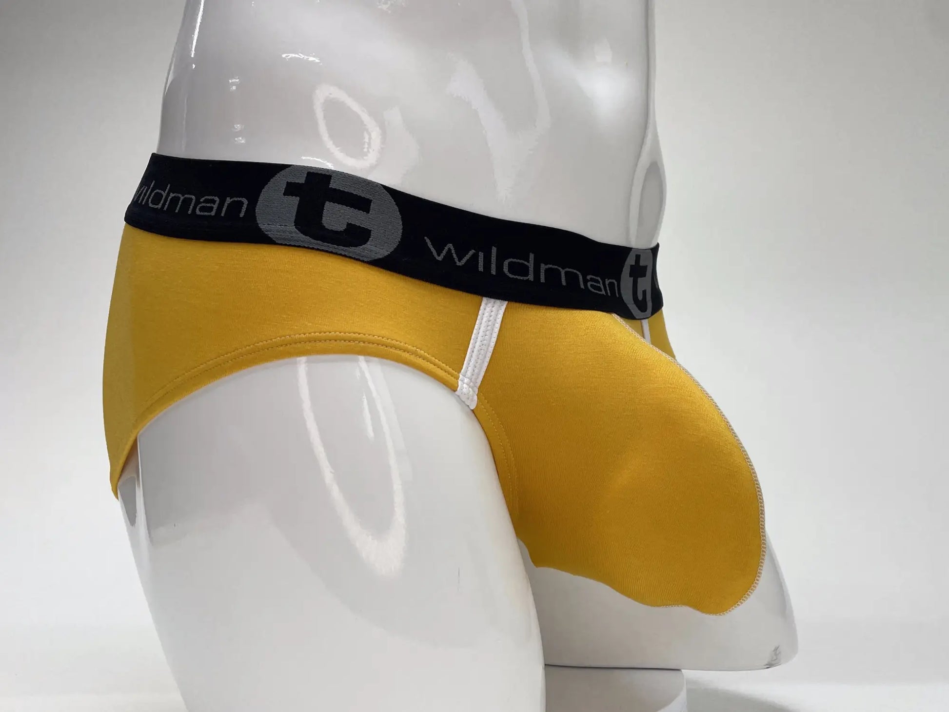 Wildmant modal big boy pouch brief gold in yellow with black waistband white stitching and t logo on waistband