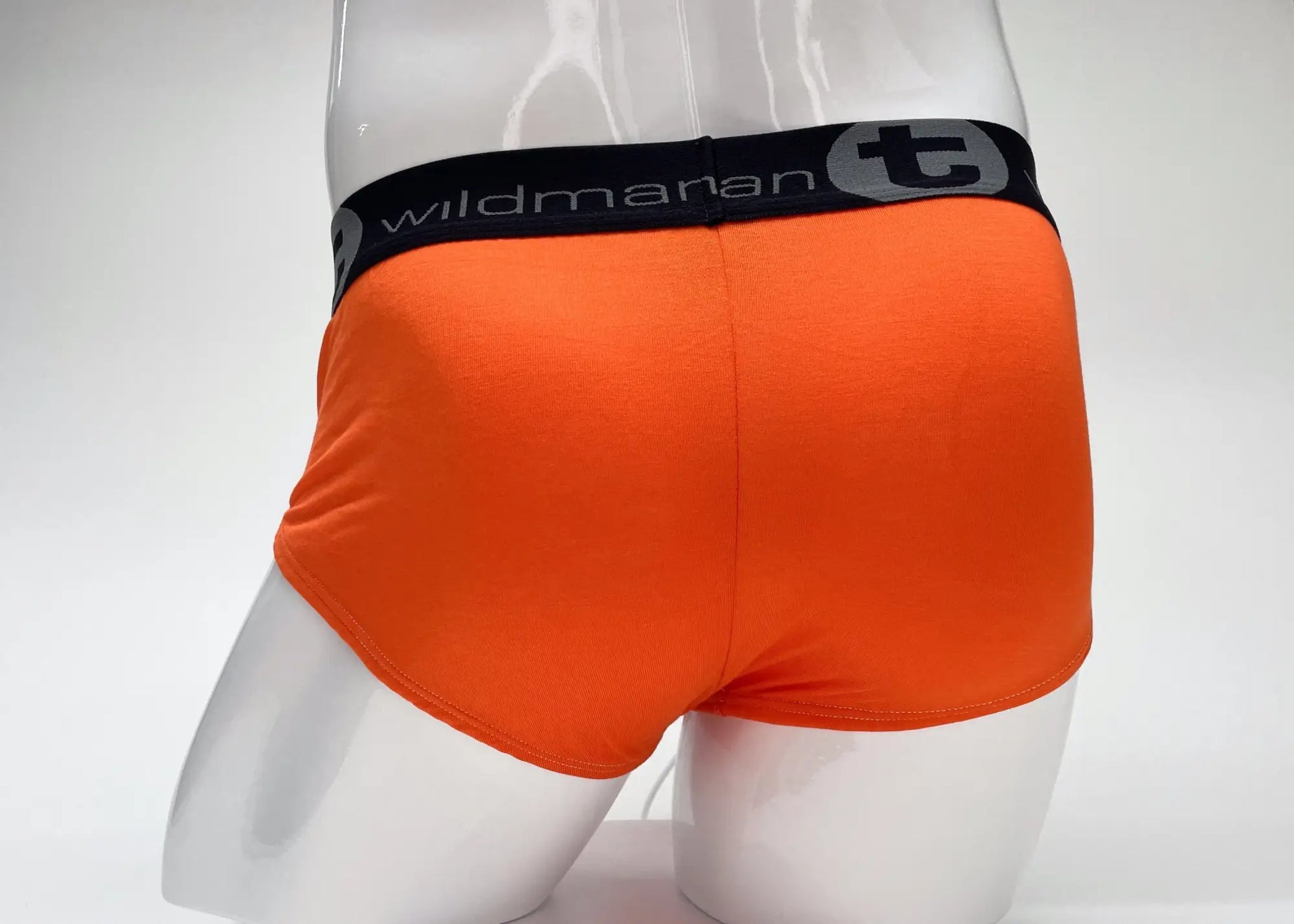 Wildmant modal big boy pouch brief in bright orange with black elastic waistband featuring wildmanan logo