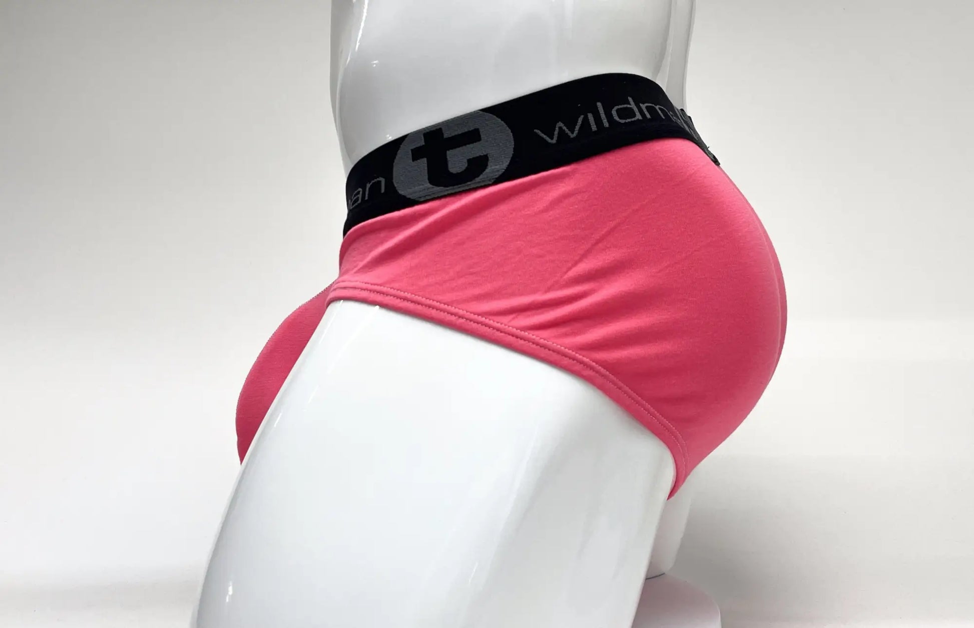 Pink wildmanT modal big boy pouch brief with black elastic waistband featuring wildman brand logo