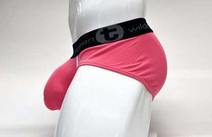 Pink wildmanT modal big boy pouch brief with black elastic waistband featuring wildman logo front view