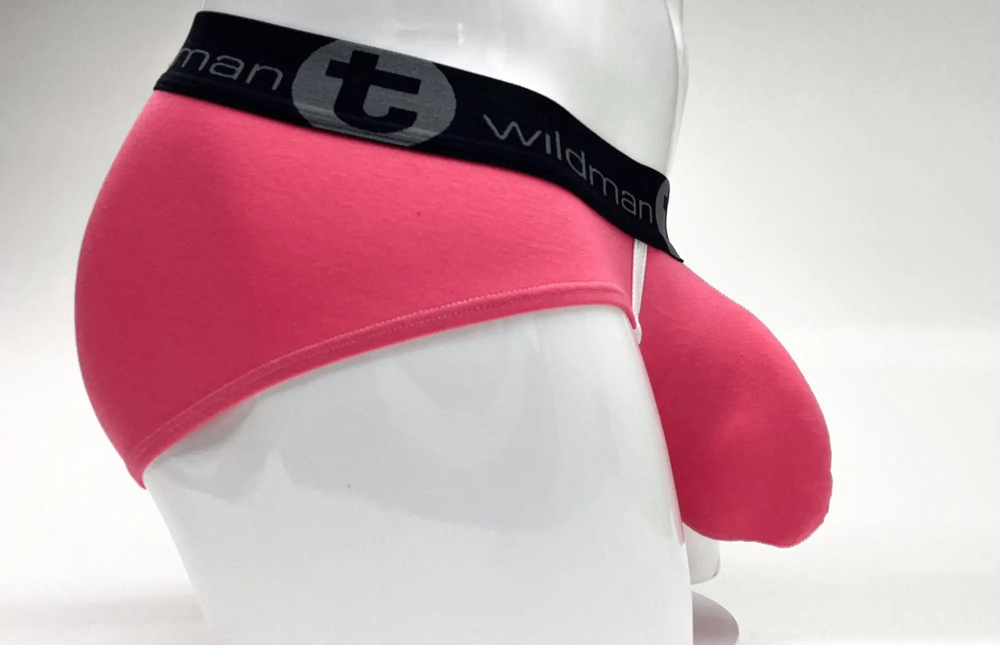 Pink wildmanT modal big boy pouch briefs with black elastic waistband and wildman brand logo