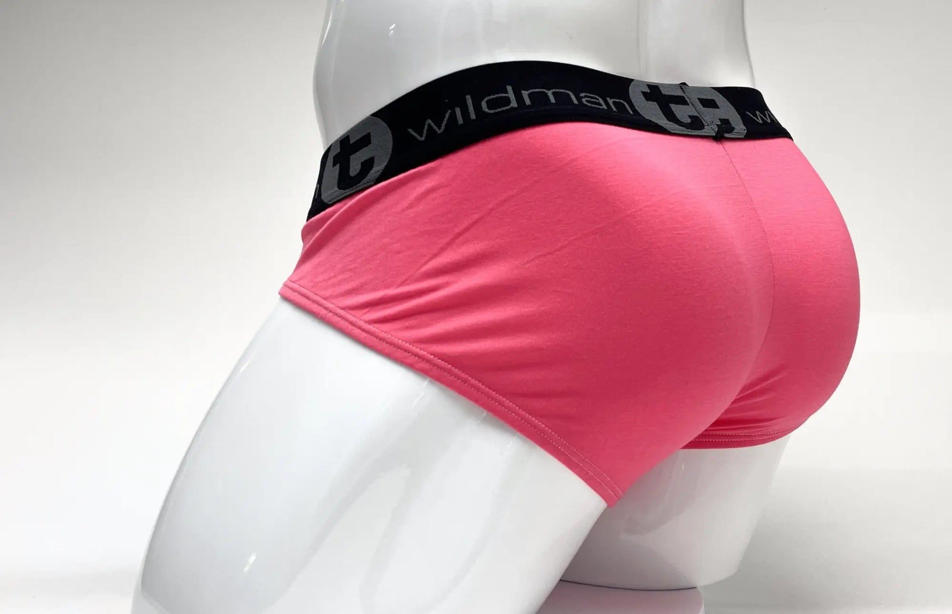 Pink wildman modal big boy pouch briefs with black elastic waistband featuring wildman logo