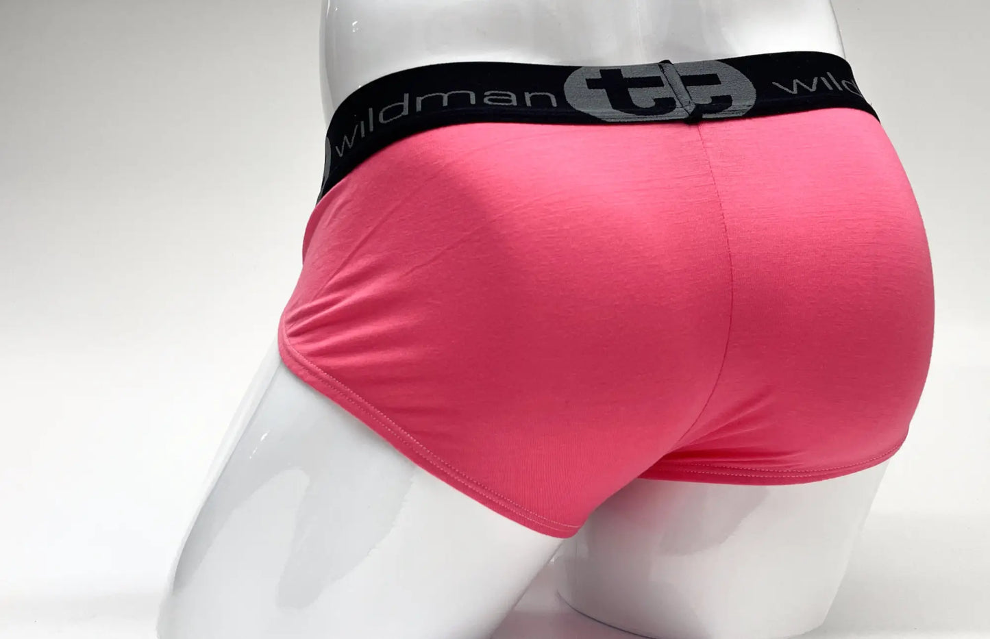 Pink wildman modal big boy pouch briefs with black elastic waistband featuring wm logo designed for comfort and support