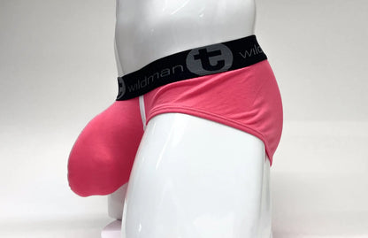 Pink wildman men’s modal big boy pouch brief with black elastic waistband featuring t logo and text