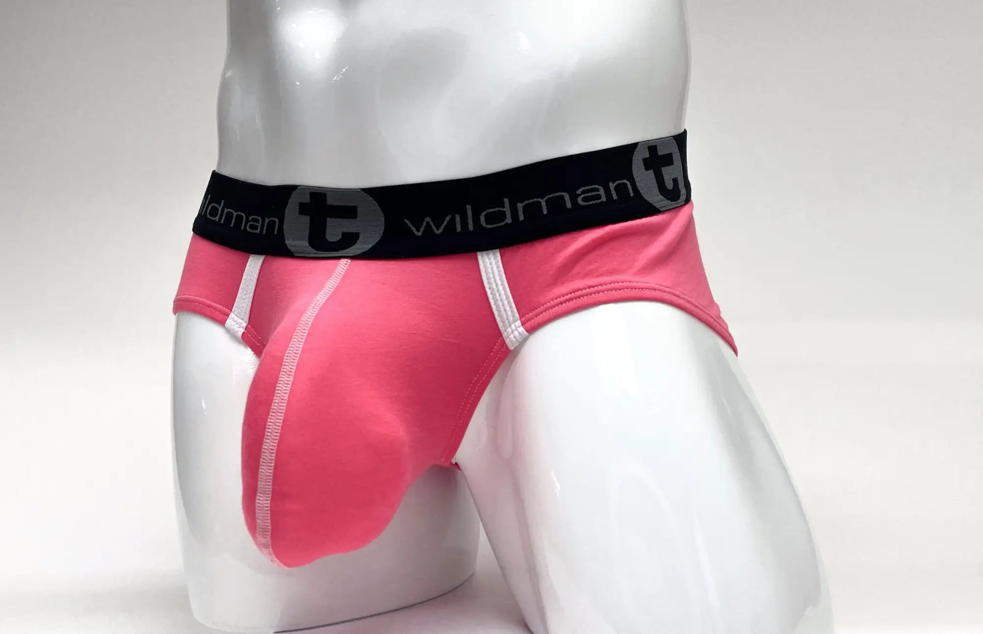Pink wildman modal big boy pouch briefs with black elastic waistband featuring the brand logo