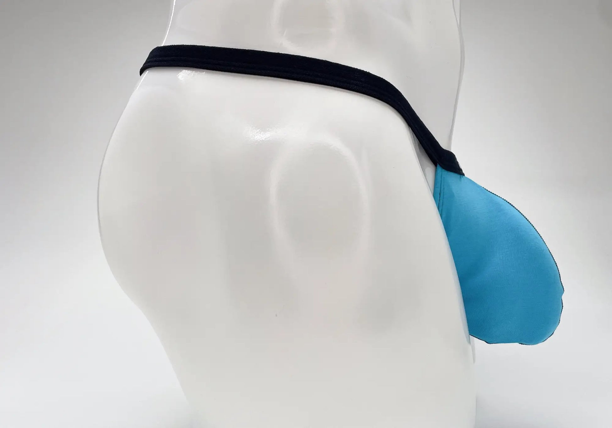 Wildmant modal micro thong big boy pouch in baby blue and black with supportive contoured design for athletic use