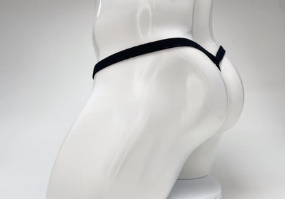 Wildmant modal micro thong big boy pouch baby blue with black elastic waistband and side tab on white mannequin
