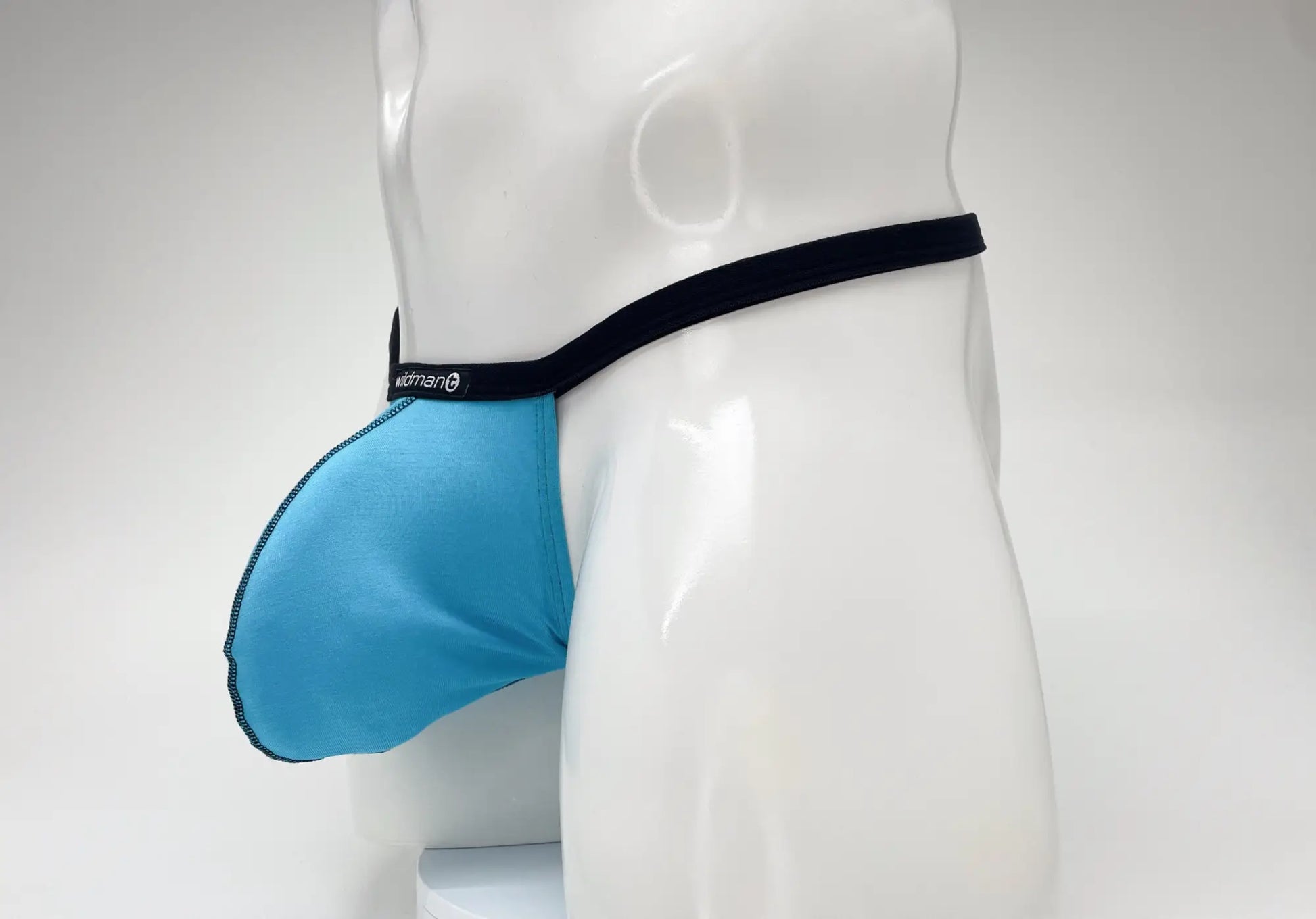 Wildmant modal micro thong big boy pouch in baby blue and black with supportive contoured design for men