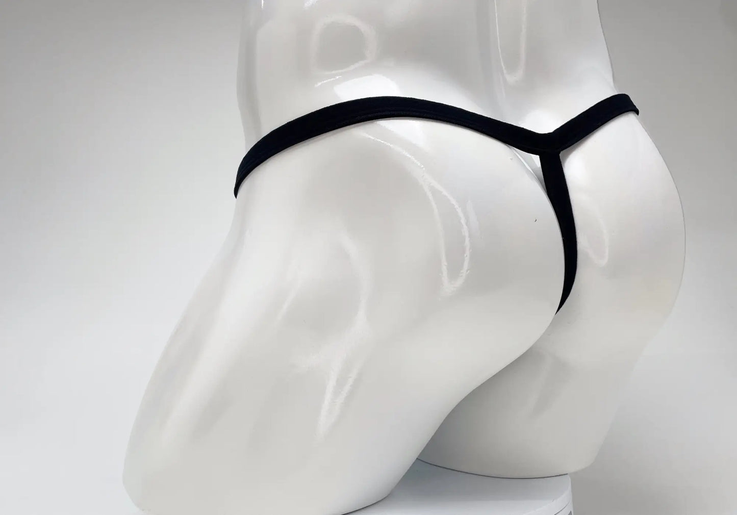 Black thong with sleek minimalist design made of modal fabric in baby blue from wildmant modal micro thong line