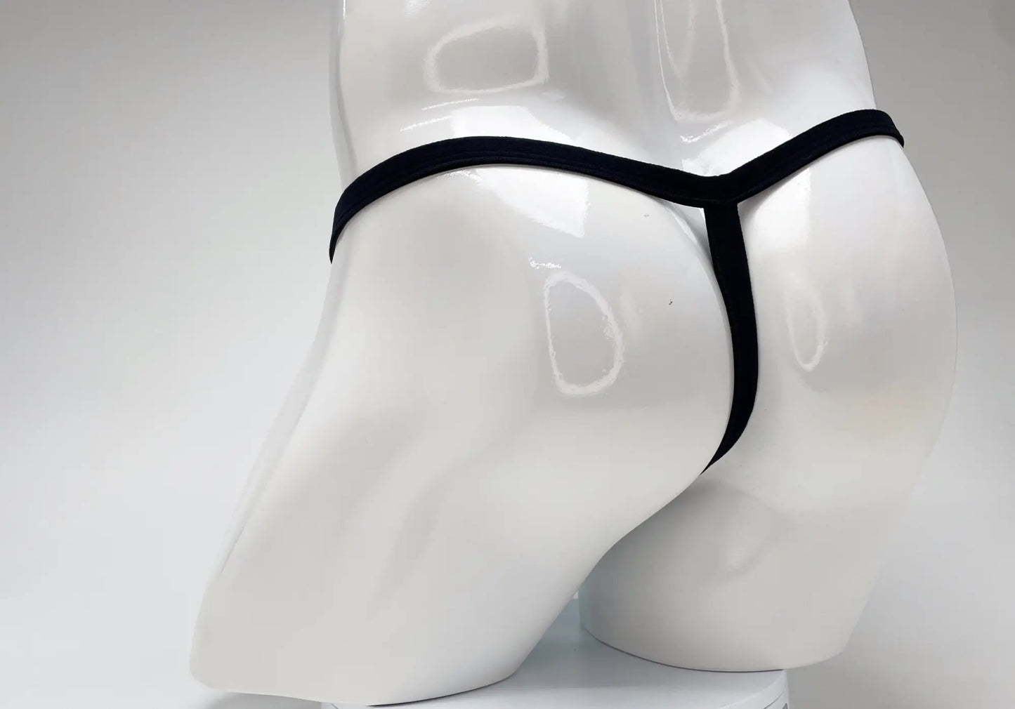 Wildmant modal micro thong big boy pouch in baby blue displayed on white mannequin front side