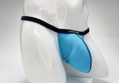 Baby blue modal micro thong with a prominent "Big Boy" pouch and black waistband featuring a WildmanT logo tag.