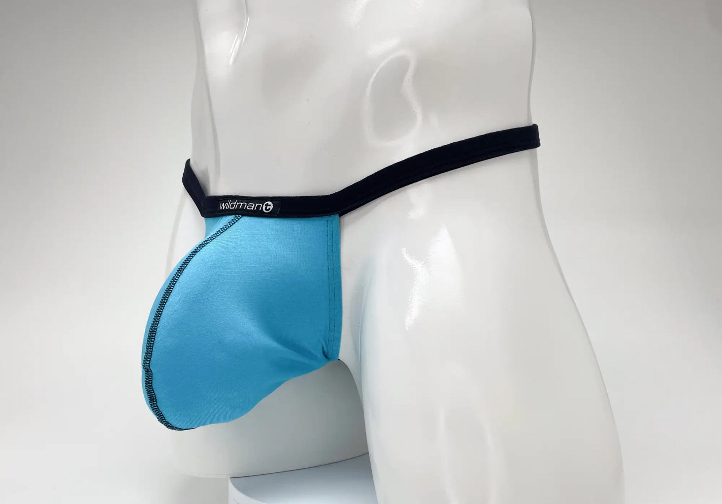 Blue wildman brand men’s briefs with a black waistband made of modal fabric in baby blue wildmant modal micro thong style