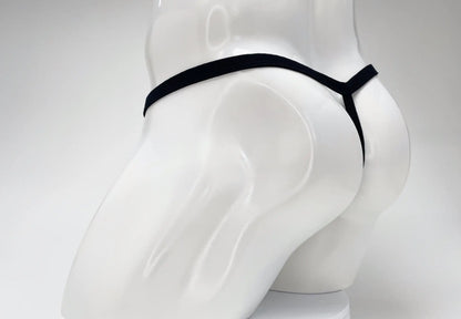 Black elastic thong with minimalist design made from modal fabric featuring big boy pouch by wildmant