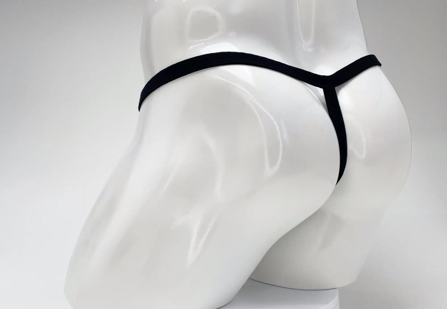 Wildmant modal micro thong black with sleek minimalist design and big boy gold pouch for comfortable wear