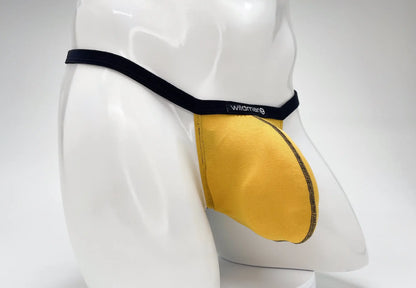 Yellow modal micro thong briefs with black wildman elastic waistband and big boy pouch in gold color