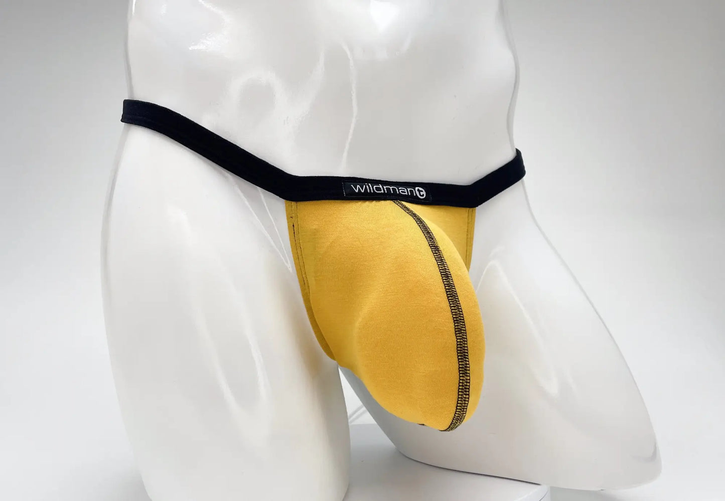 Yellow wildman brand briefs with black waistband and gold-trimmed seam wildmant modal micro thong big boy pouch gold