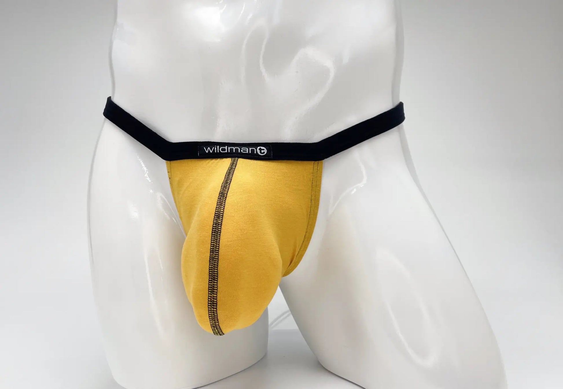 Yellow wildman brand briefs with black waistband and central zipper in wildmant modal micro thong big boy pouch gold
