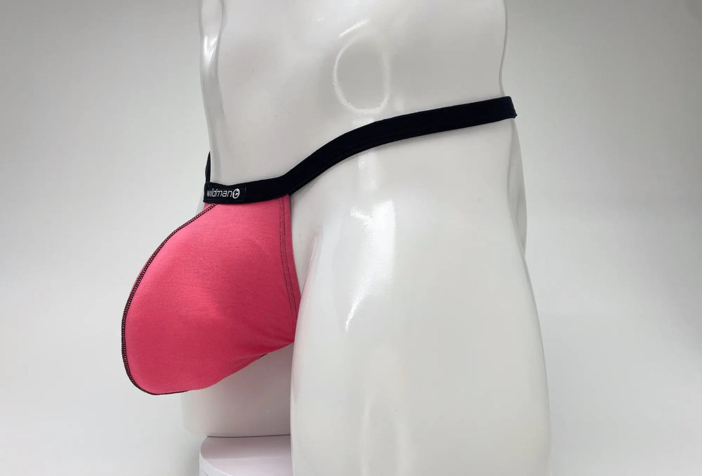 Pink wildmanT modal micro thong big boy pouch briefs with black elastic waistband and wideman brand logo