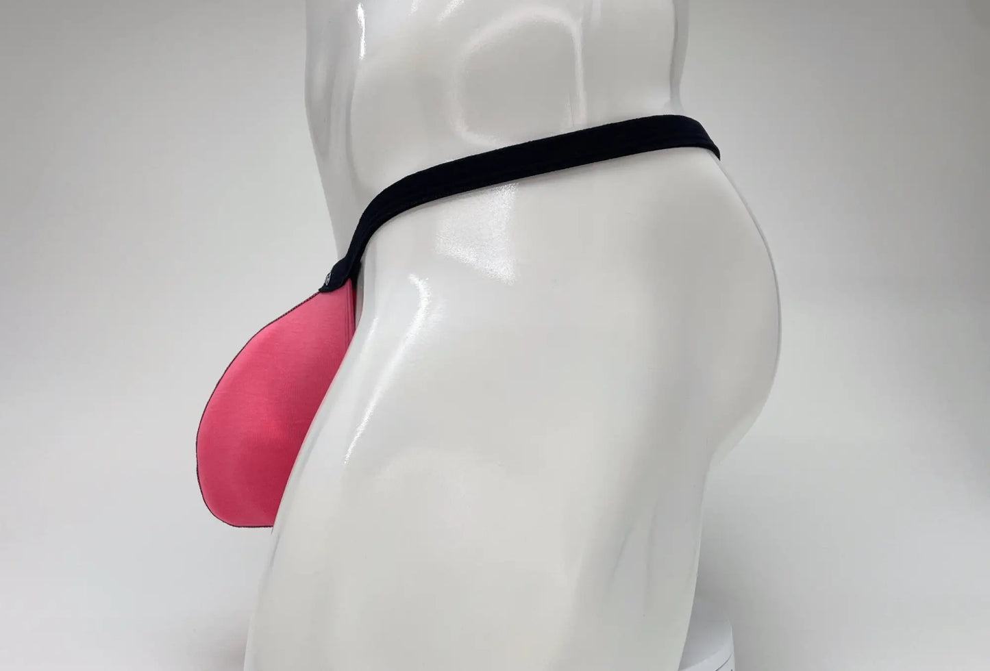 Wildmant modal micro thong big boy pouch in pink silicone with black elastic band for comfortable support