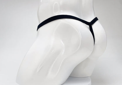 Wildmant modal micro thong in purple with a minimalist design and big boy pouch shown from the back side