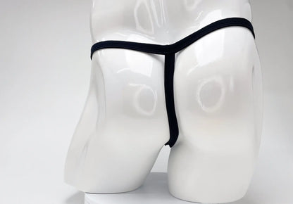 Back view of a white male mannequin wearing a black WildmanT micro thong with thin side straps.