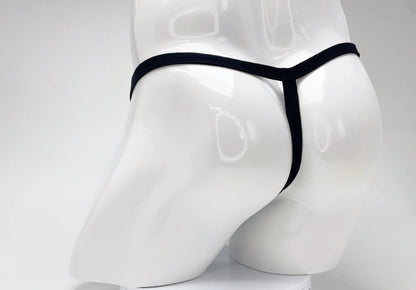 Black modal micro thong with big boy pouch displayed on white mannequin for wildmant purple product line