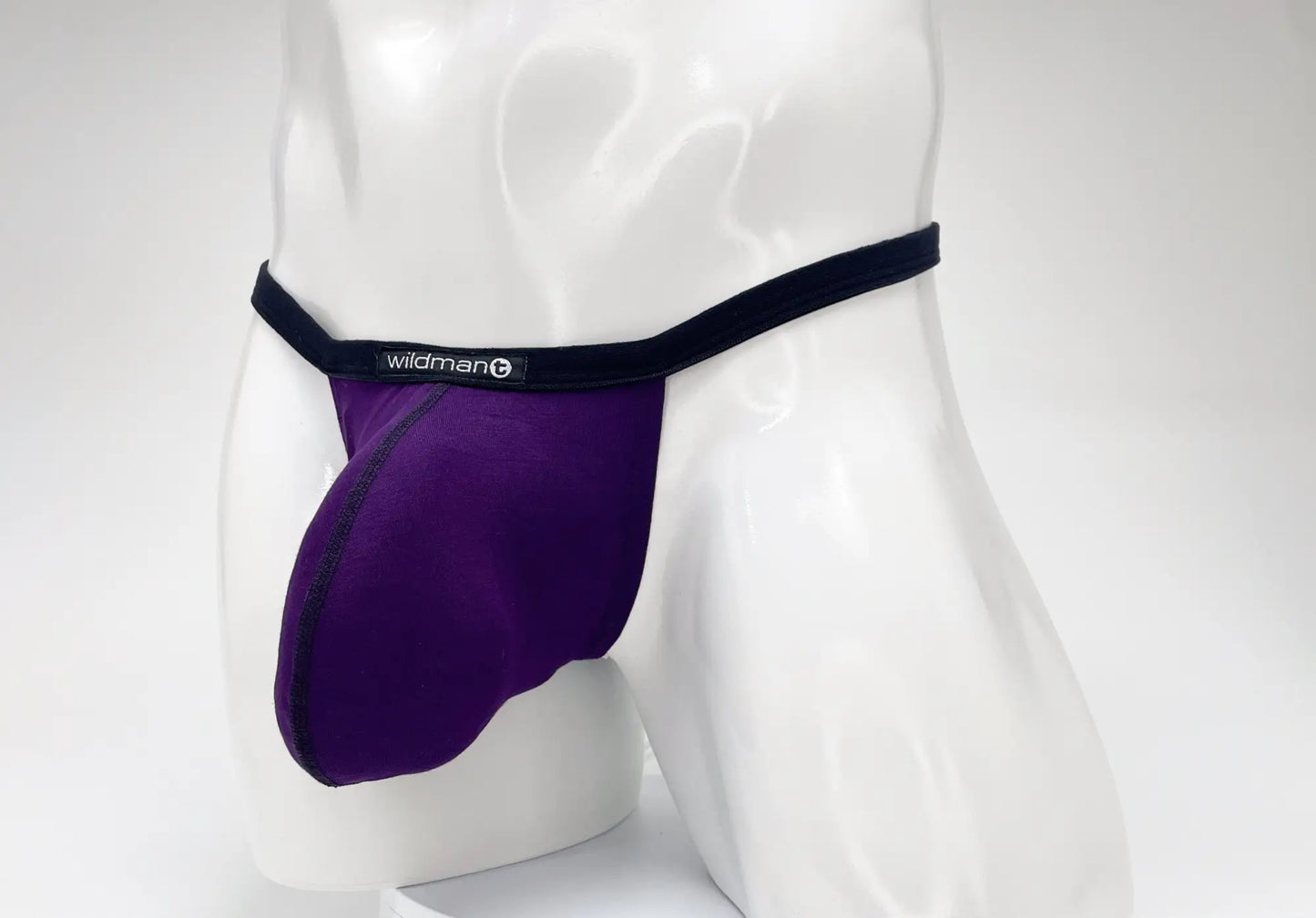 Purple wildman brand modal micro thong with black waistband and big boy pouch for comfortable support