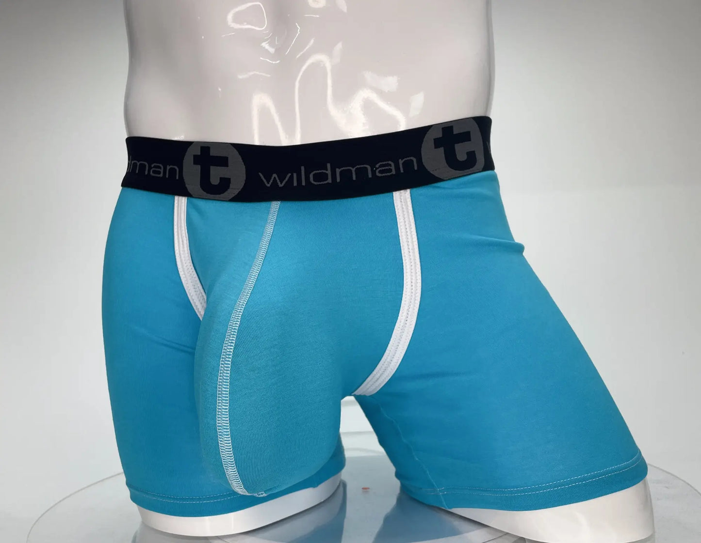 Bright blue wildmanT modal boxer briefs with white trim and black waistband featuring wildman logo and 5 inch inseam