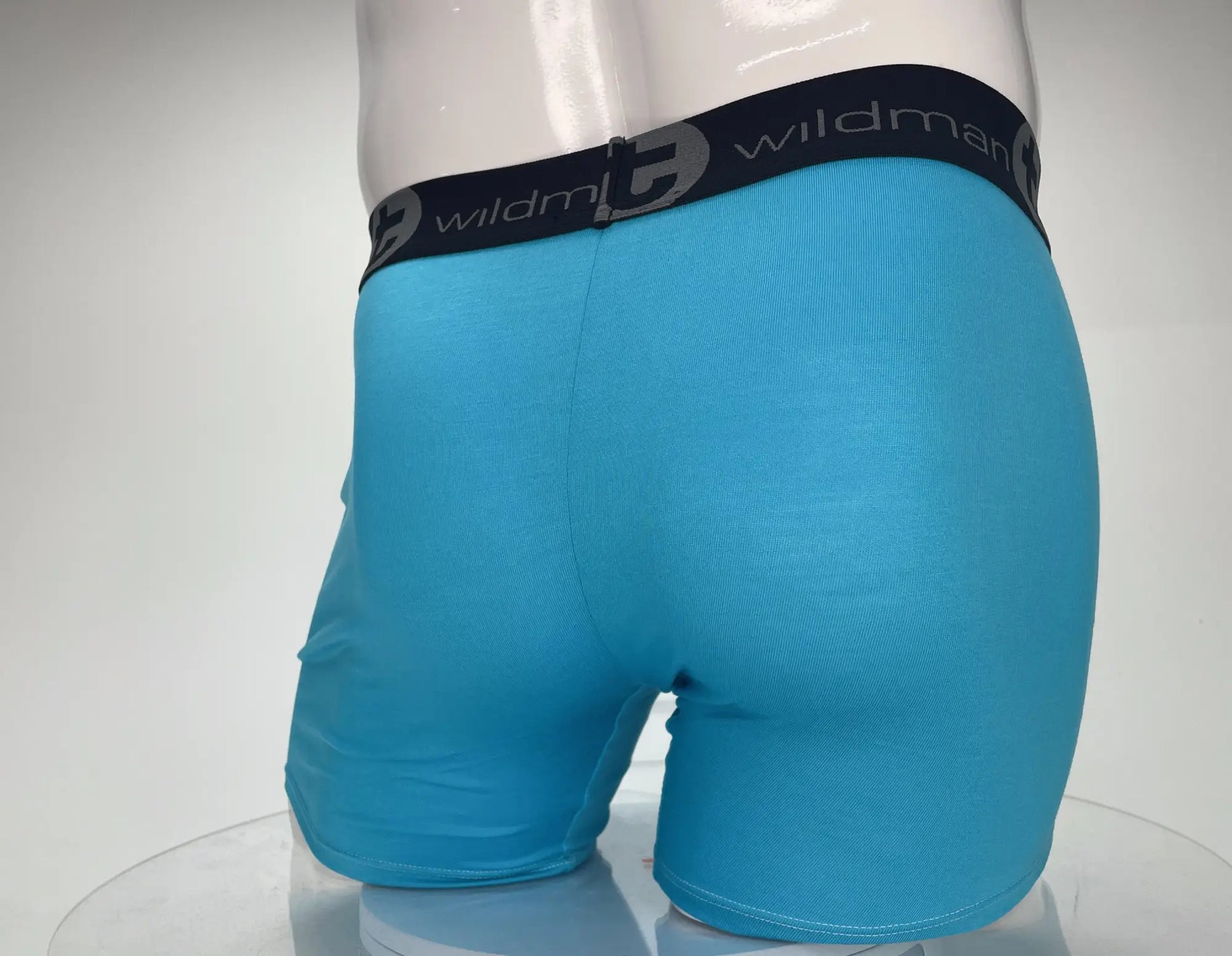 Bright blue modal wildmanT boxer briefs with 5 inch inseam and black waistband featuring wildman logo in gray