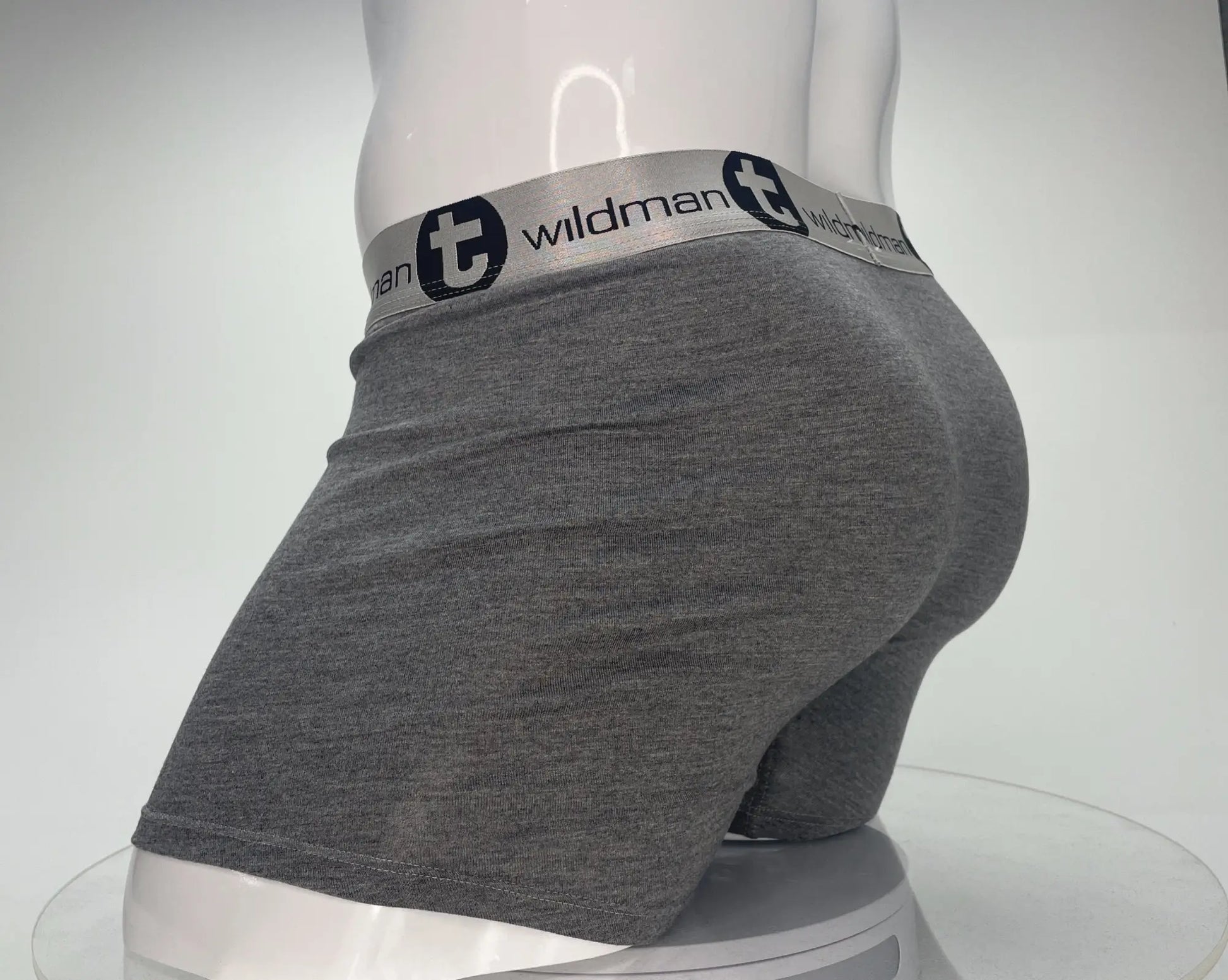 Gray heathered modal boxer briefs with 5 inch inseam and silver wildman waistband featuring black lettering