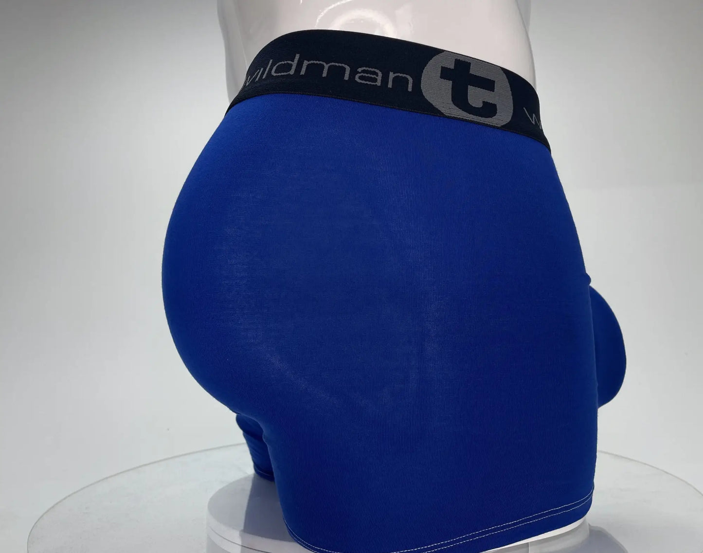 Royal blue wildmanT modal monster cock boxer brief with 5 inch inseam and black waistband with logo and stylized t emblem