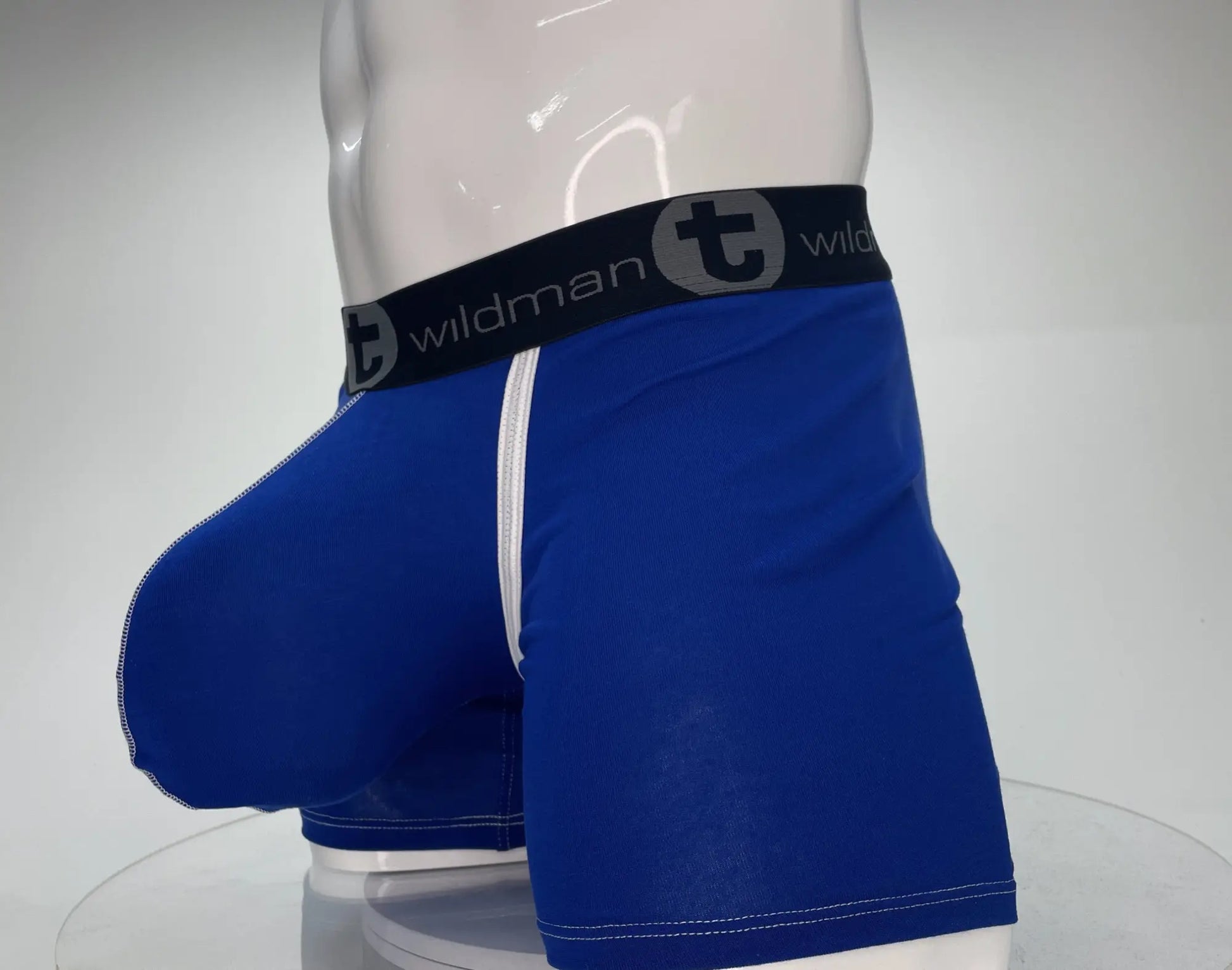 Royal blue wildman modal boxer briefs with 5 inch inseam black waistband and white stitching along leg seams