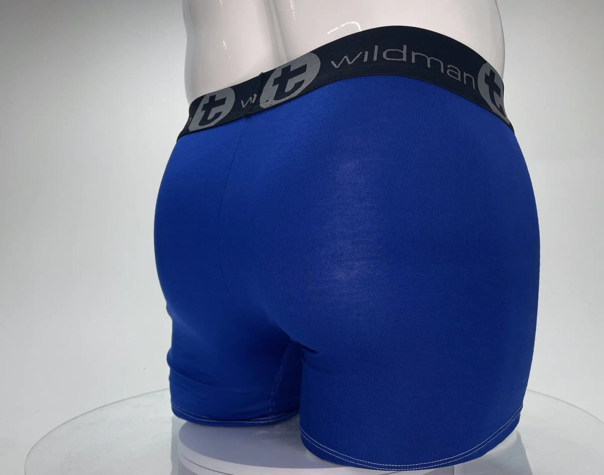 Wildmant modal monster cock boxer briefs in royal blue with 5 inch inseam and black waistband with gray logo